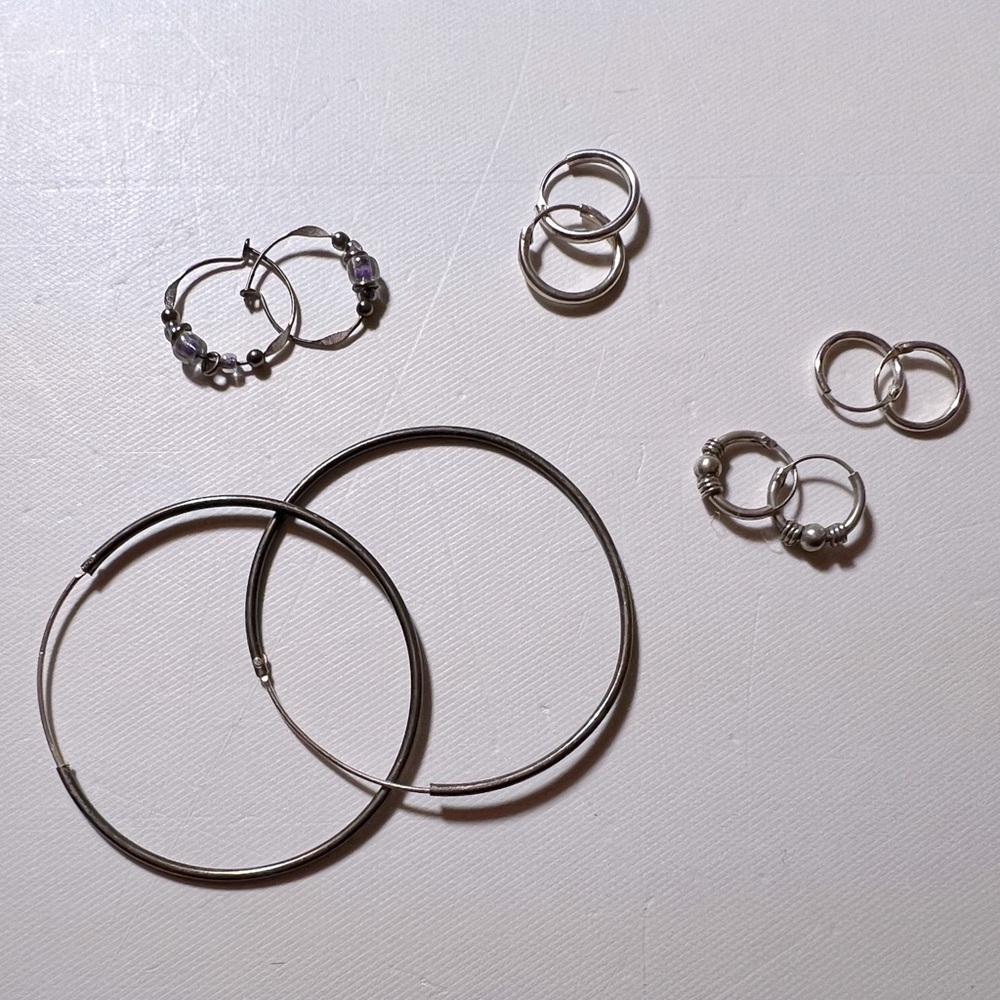 Bundle of 5 silver hoop earring sets, ranging from tiny to large